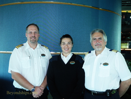 Picture Captain Gus Anderrson, Guest Relations Manager Snezana Katic, Hotel Director Michael Landry of Enchantment of the Seas