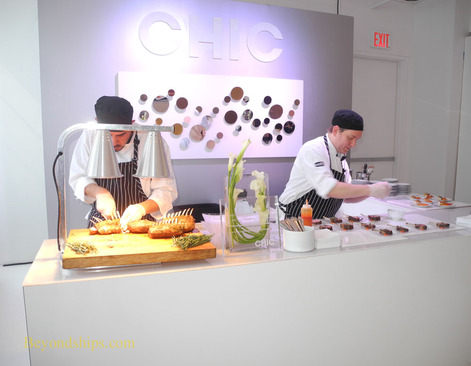 Chefs preparing food at the unveiling of Dynamic Dining on Quantum of the Seas