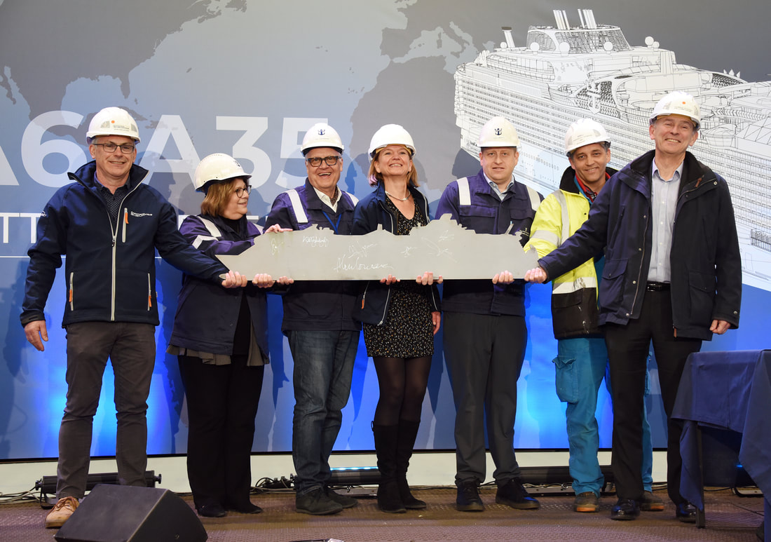  Executives of Royal Caribbean and Chantiers d' Atlanique at the steel-cutting ceremony for Utopia of the Seas.