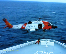 Coast Guard helicopter performing medical evacuation from Norwegian Breakaway cruise ship.