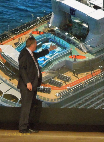 Richard Fain points out the location of the skydiving simulator on Quantum of the Seas.